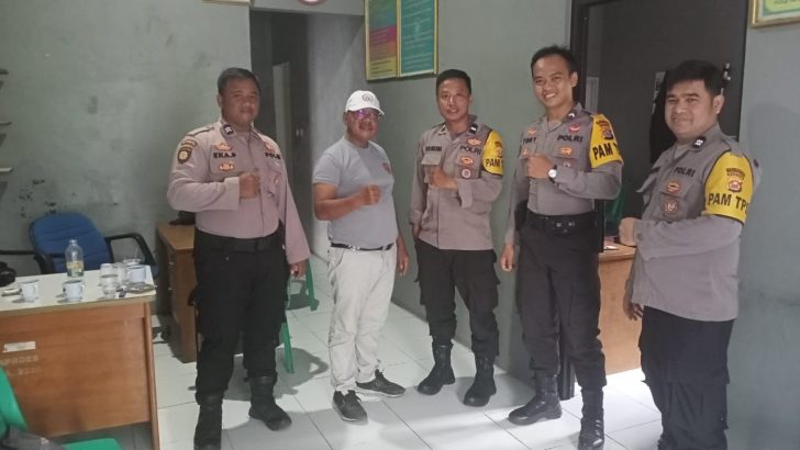 Anggota Satsamapta Polresta Tangerang Melaksanakan Pengamanan pemilu di Desa Ranca Labuh Kecamatan Kemeri