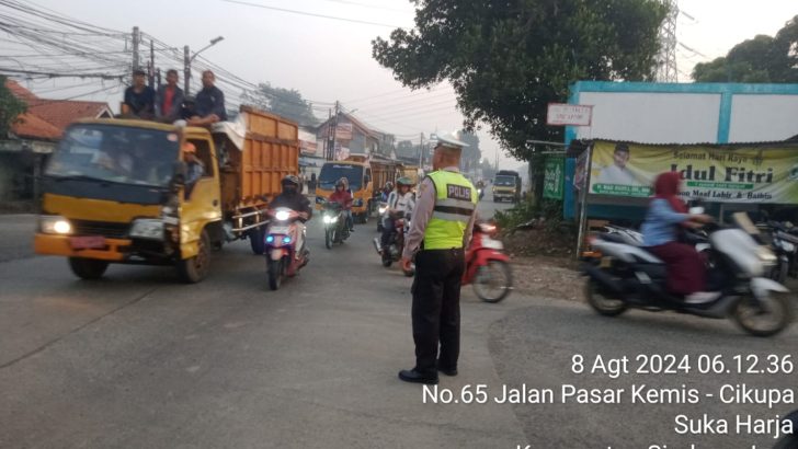 Anggota Lantas Aiptu Usman Laksanakan Gatur Lalin Pagi Hari