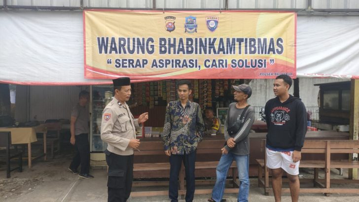 Bhabinkamtibmas Desa tobat melakukan himbauan Kamtibmas